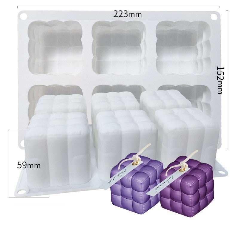 Silicone candle mold with six cube-shaped cavities, heat-resistant and food-grade material, easy to demold and clean, perfect for DIY candles.