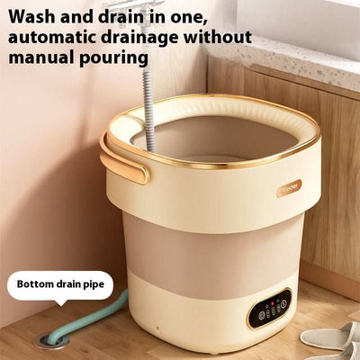Compact beige mini washing machine with automatic drainage and bottom drain pipe in kitchen corner