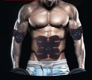 Muscular man using LAM-501 Portable Muscle Stimulator pads on abs and arms for muscle toning